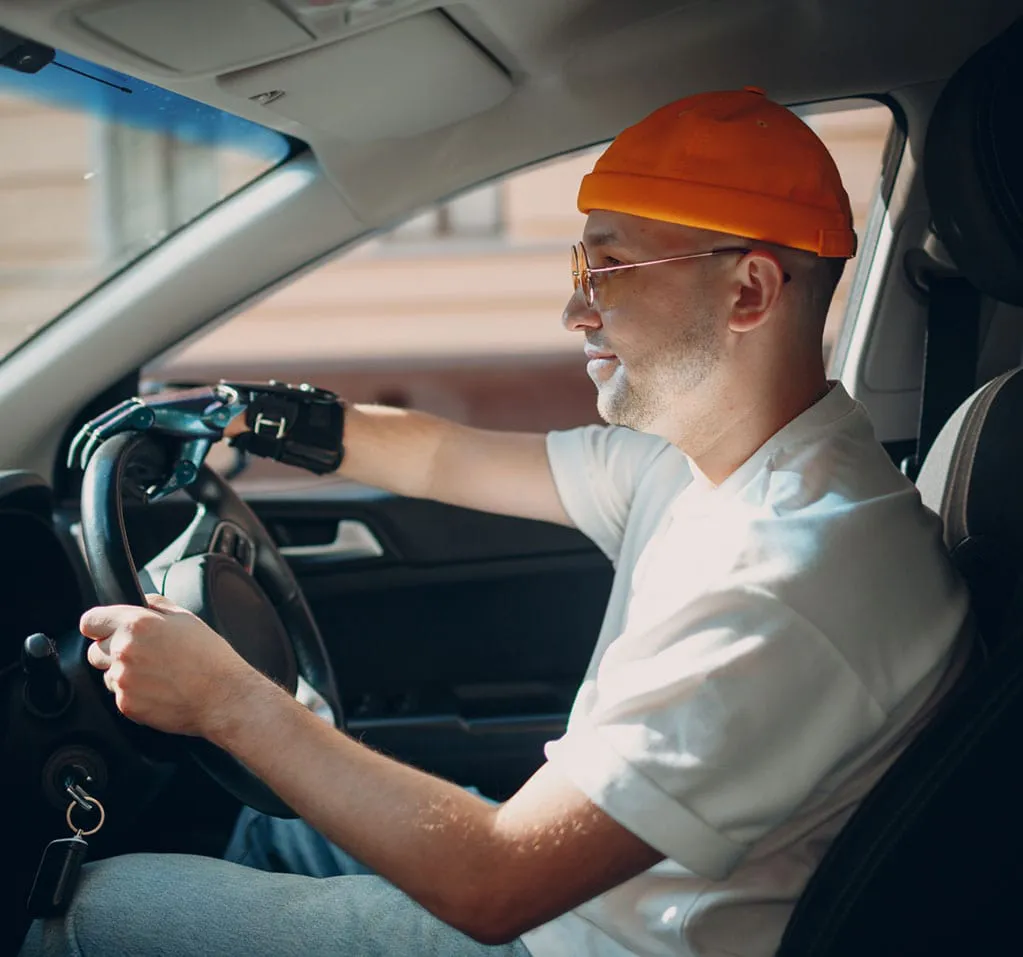 An image of a man driving a car