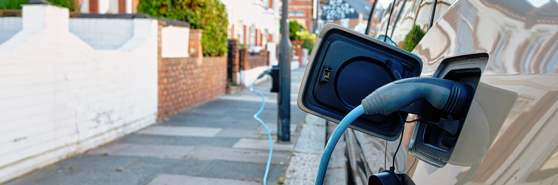 New electric car grant - electric vehicle on charge