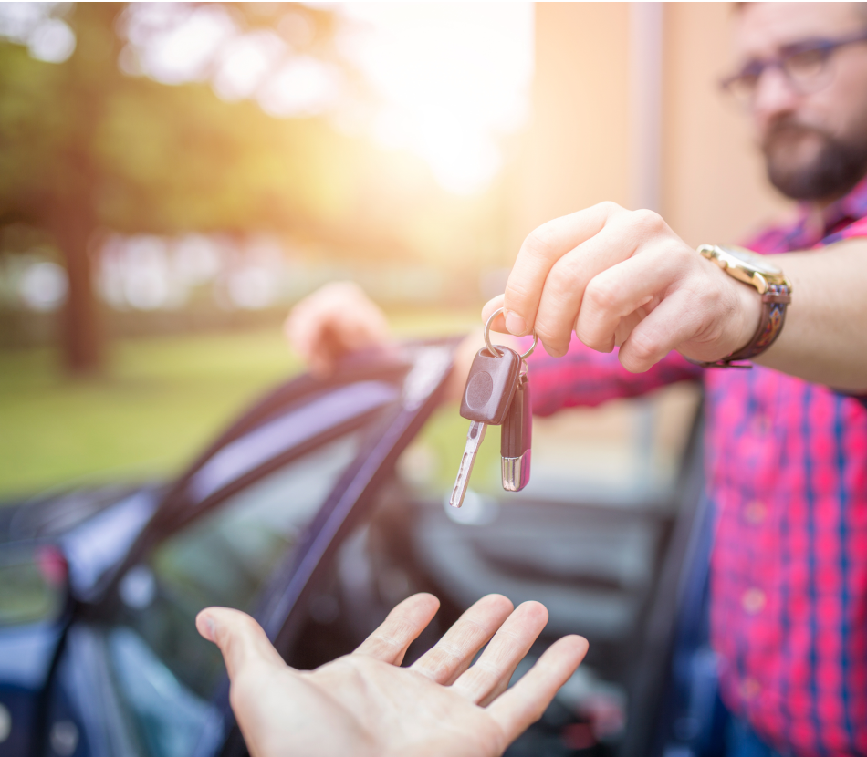 Consumer handing over car keys