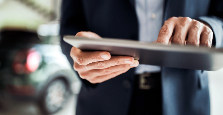 A sales manager using a digital device