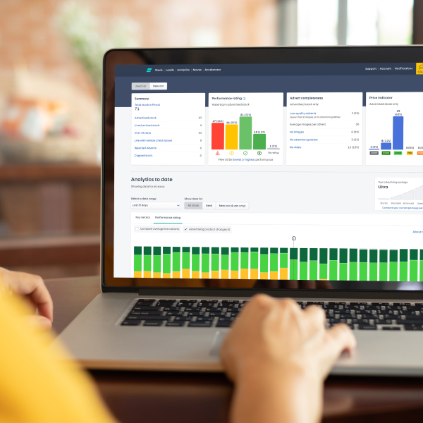 A consumer accessing Dealer Portal via a laptop